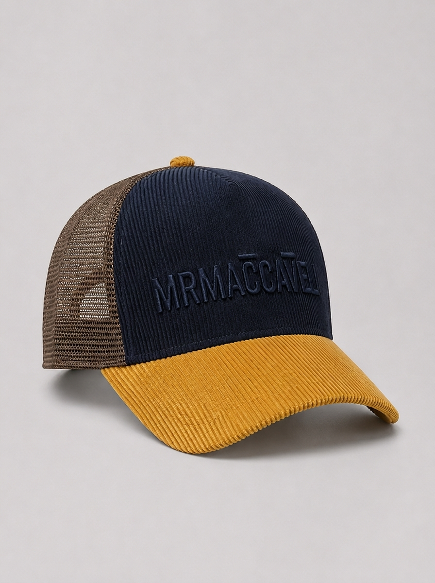 MrMaccaveli wordmark corduroy trucker cap in navy and mustard